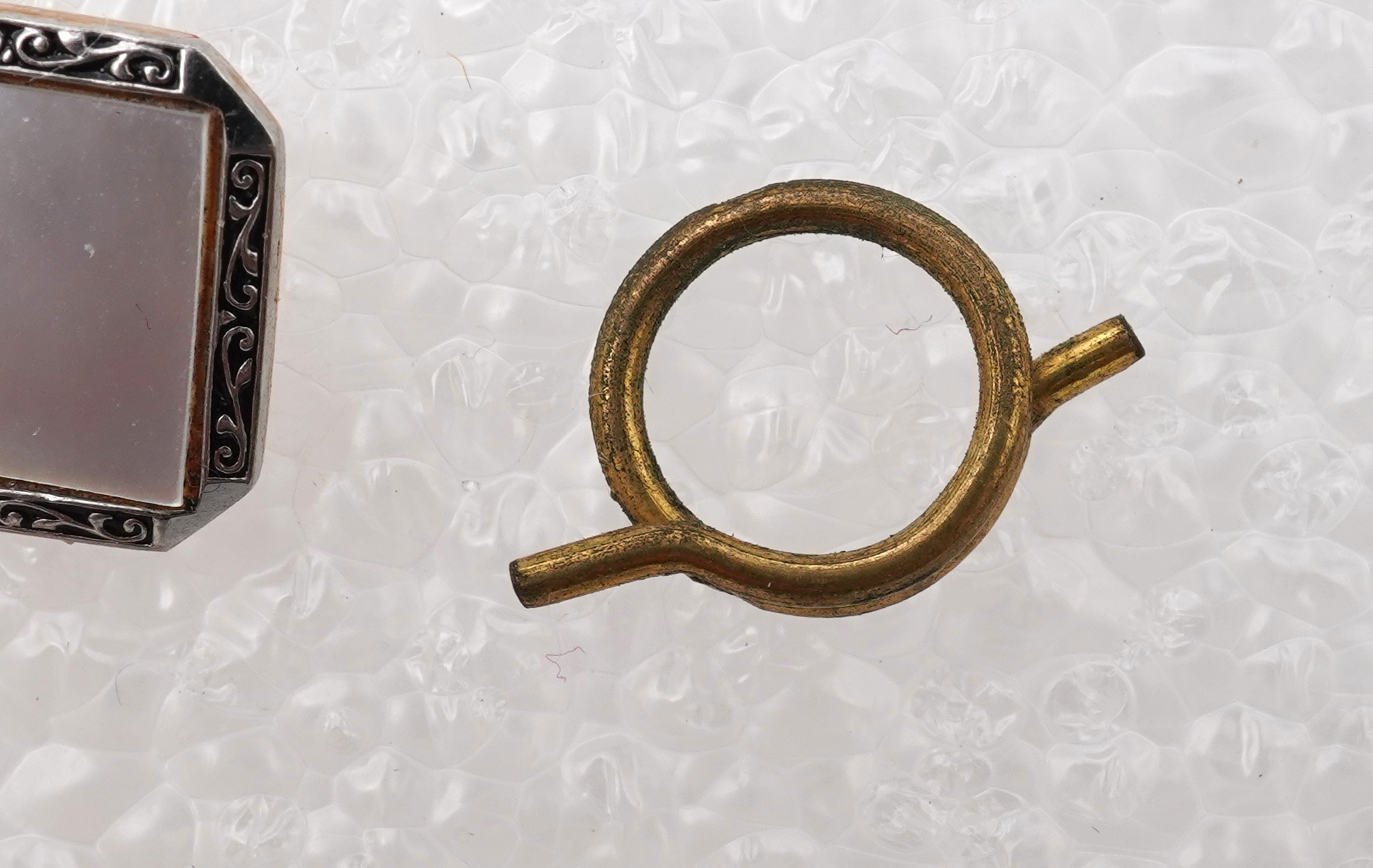 A mother of pearl dress set , early 20th century